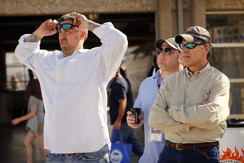 Former Texas Gov.  Rick Perry (right) and former U.S. Navy SEAL Marcus Luttrell, shown here...