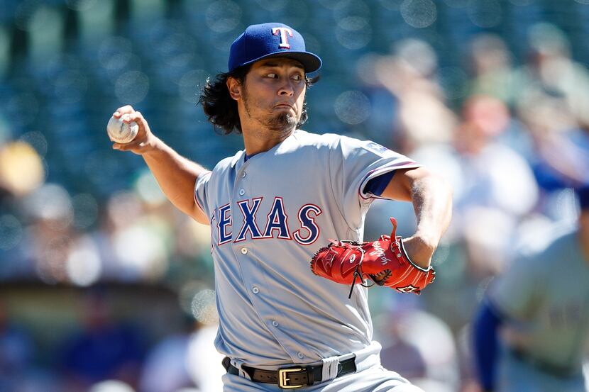 OAKLAND, CA - SEPTEMBER 24:  Yu Darvish #11 of the Texas Rangers pitches against the Oakland...