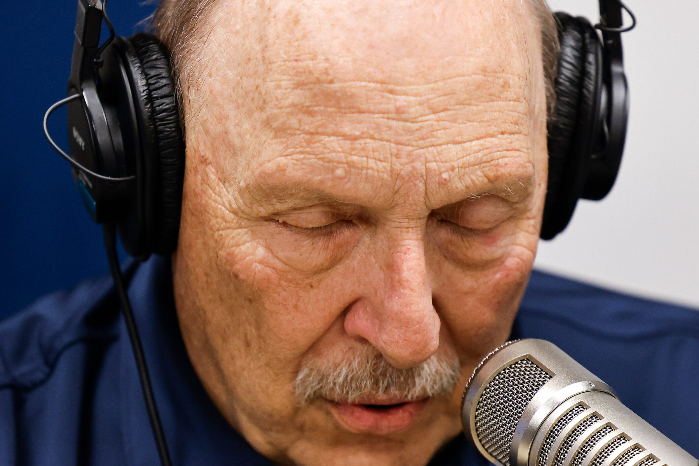 Local sports radio legend Norm Hitzges takes a deep breath as he closes his eyes before...