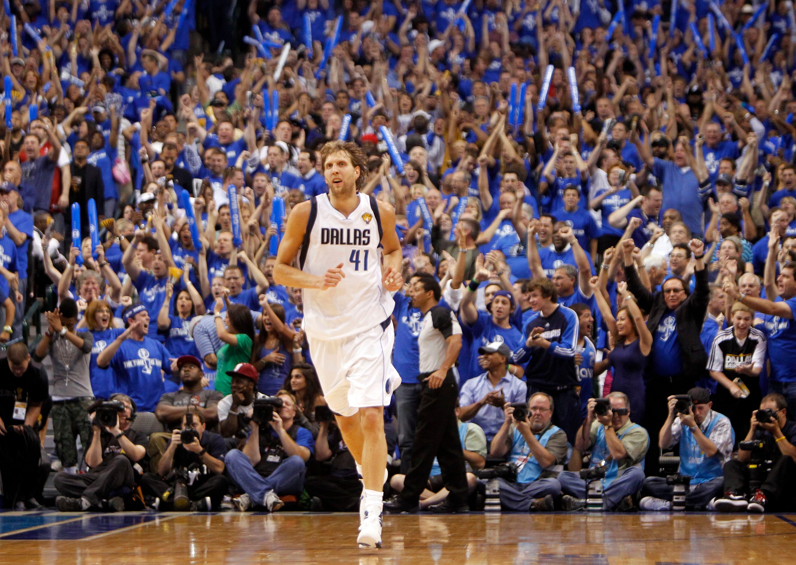 Dallas Mavericks power forward Dirk Nowitzki (41) makes his way back to play defense after...