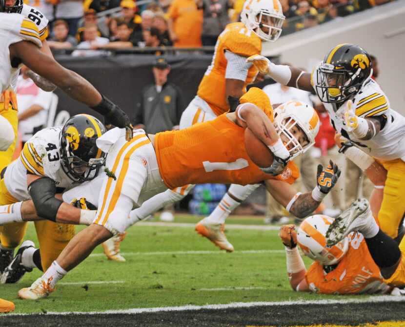 Tennessee's Jalen Hurd dives into the end zone for the Volunteers first touchdown of the...