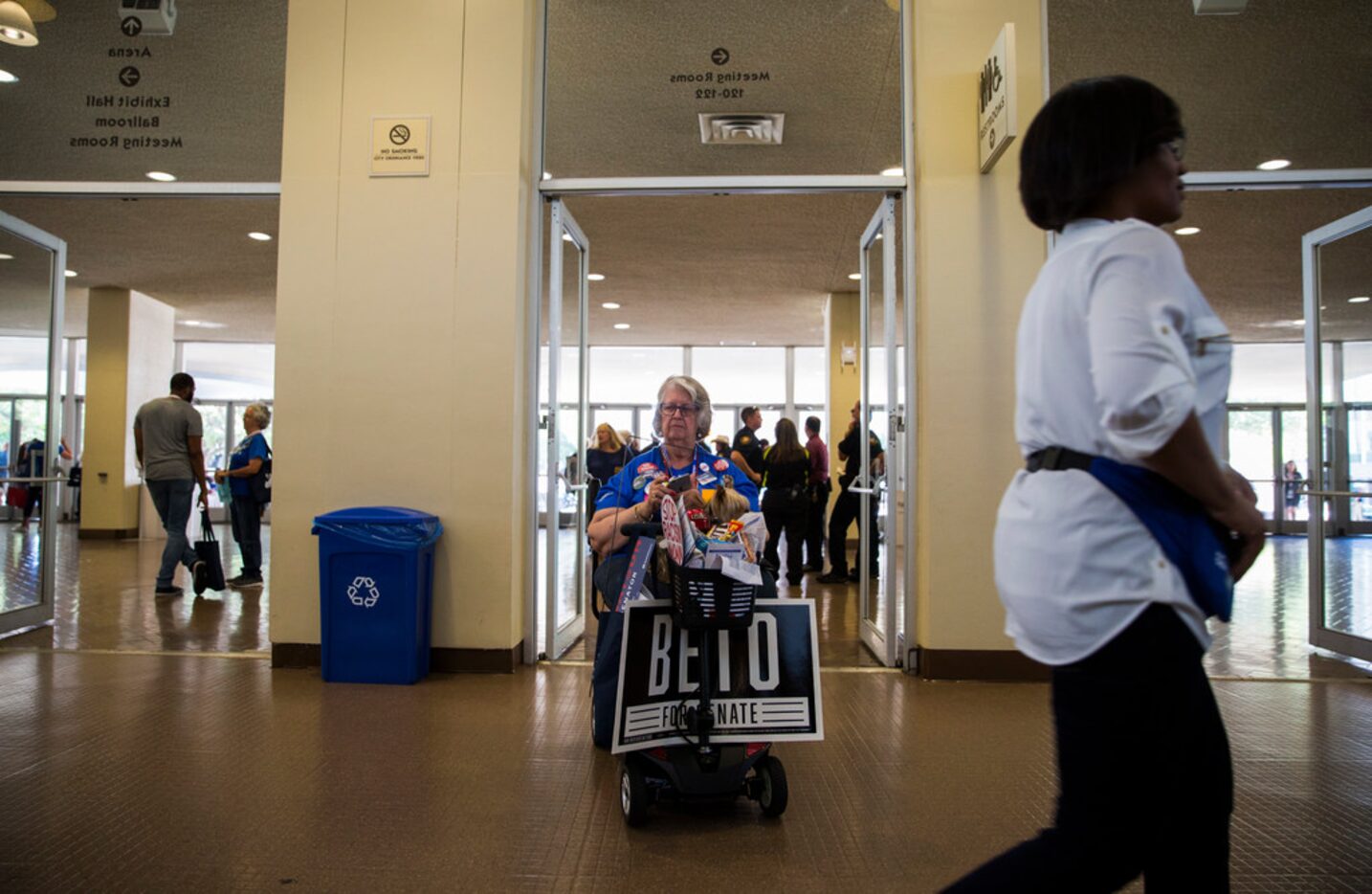 Susie Leinneweber, center and her dog, King Louis, enter the arena during the Texas...