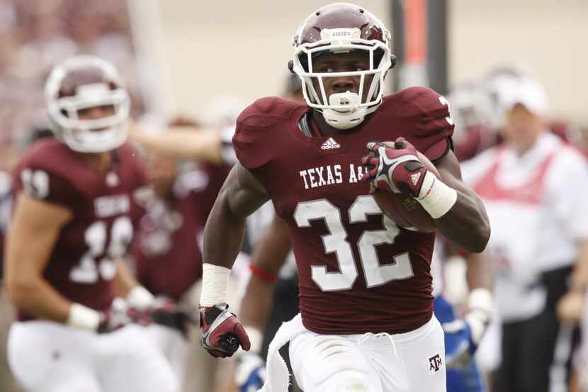 Texas A&M Aggies running back Cyrus Gray (32) runs for a touchdown during the NCAA football...