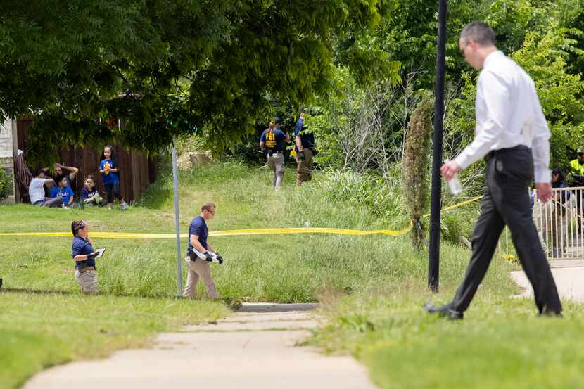 Authorities combed over the area near where the boy's body was found.
