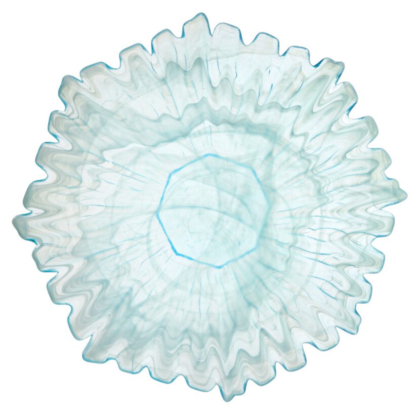 Her serve: An azure platter in a sunflower shape is hand blown and features distinctive...