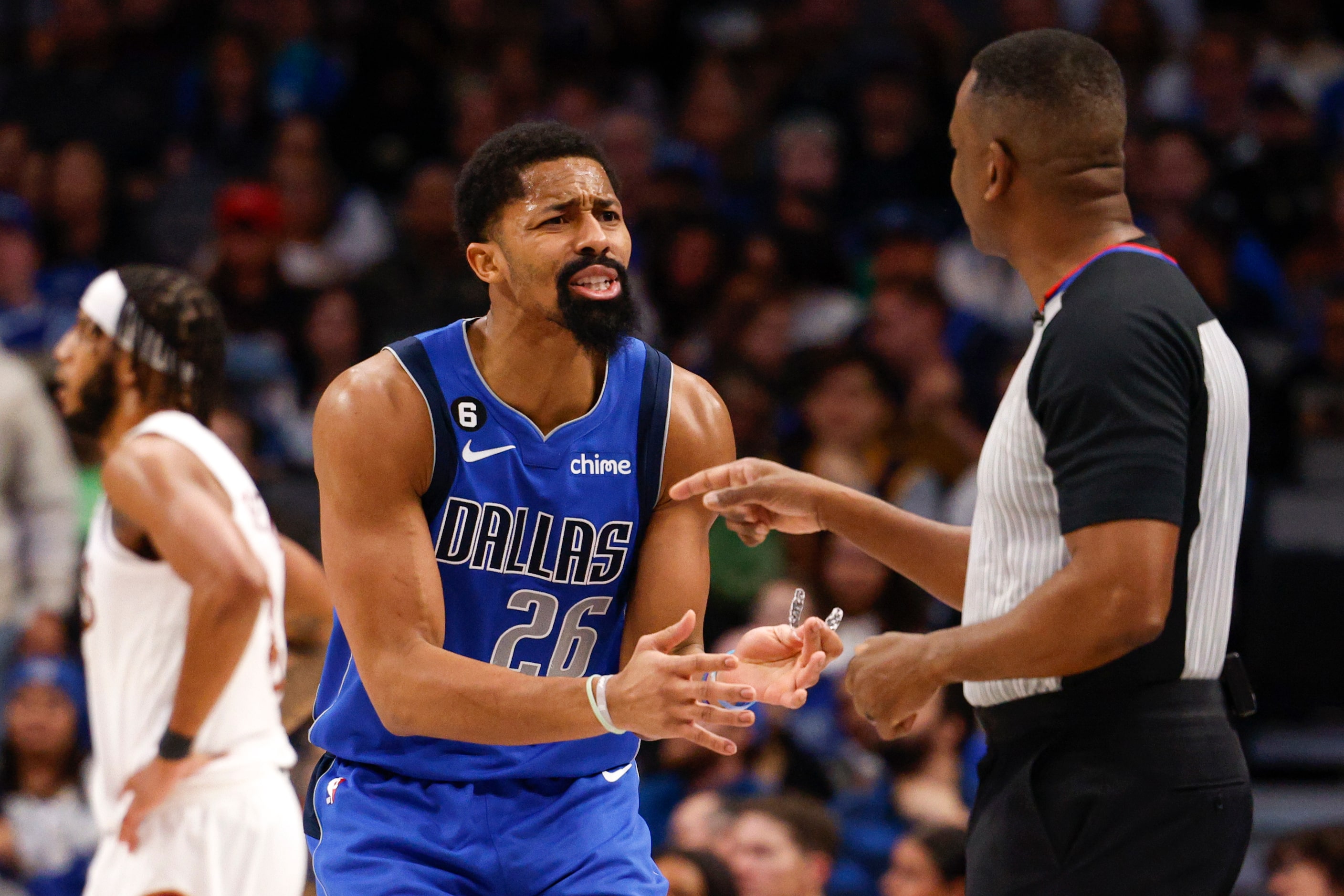 Dallas Mavericks guard Spencer Dinwiddie (26) argues with a referee after being called for...