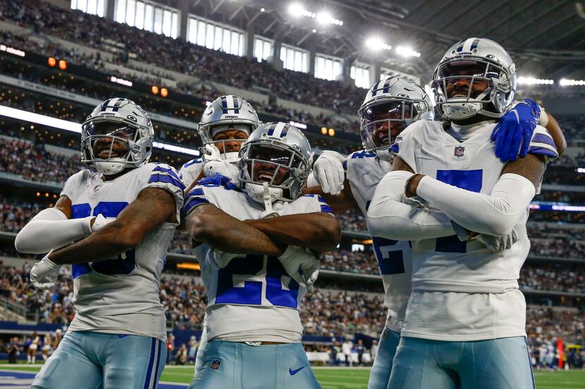 From left, Dallas Cowboys cornerback Anthony Brown (30), defensive back C.J. Goodwin (29),...