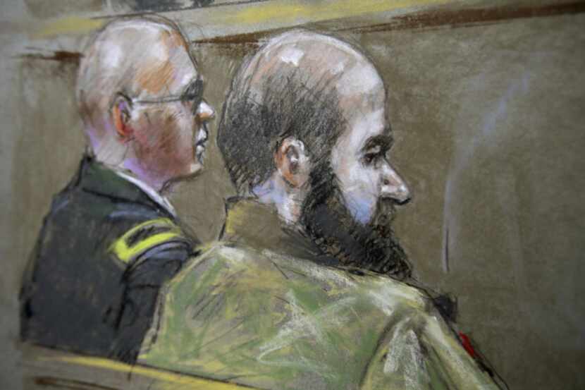 U.S. Army Maj. Nidal Malik Hasan, seen at right in this Aug. 21 courtroom sketch along with...