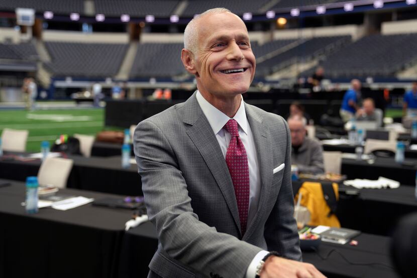 FILE - Big 12 Commissioner Brett Yormark smiles before speaking at the opening of the NCAA...