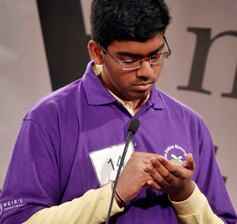 
Lokesh Nagineni spells out a word in his hand during the 56th annual Dallas Morning News...