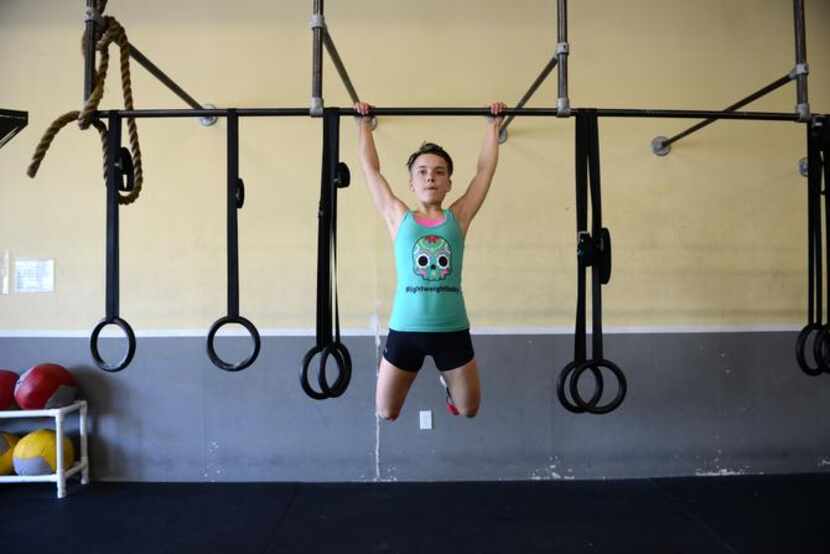 Brooklin Smith,  13, is training for the USA Weightlifting Youth National Championship on...