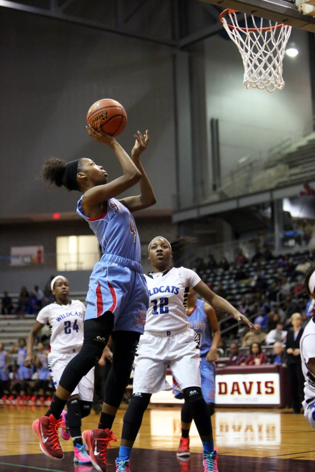 Skyline guard Raven Johnson drives to the hoop during the first half of the region II AAAAAA...