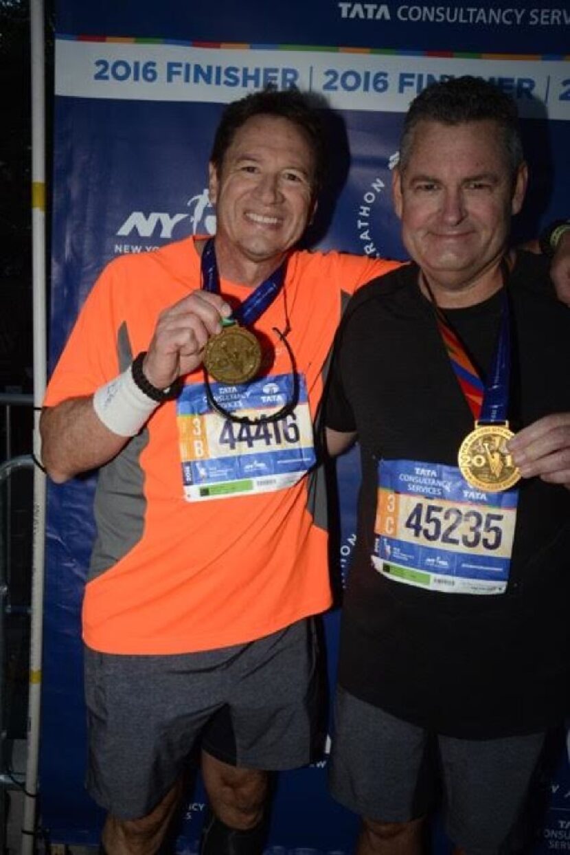 Dallas plastic surgeon and runner Patrick Pownell (left) waited for his friend and fellow...