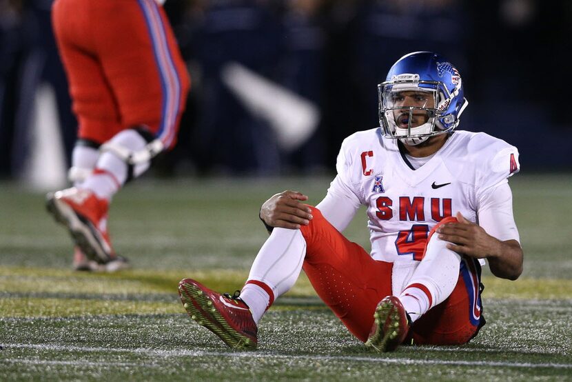 ANNAPOLIS, MD - NOVEMBER 14: Quarterback Matt Davis #4 of the Southern Methodist Mustangs...