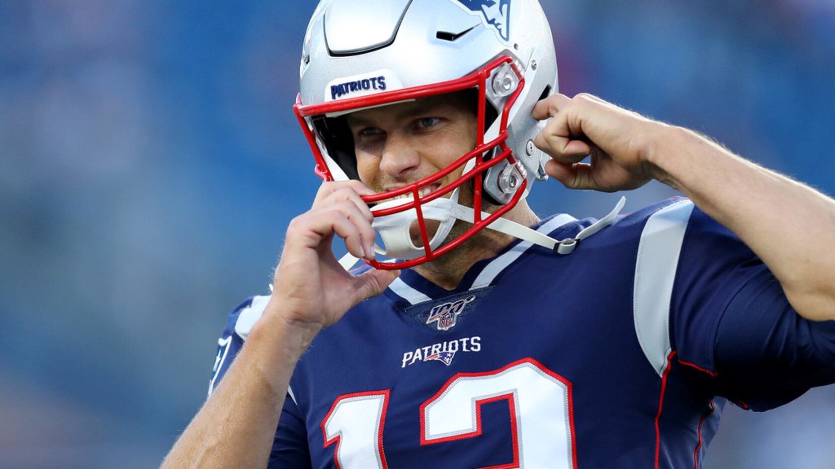 FOXBOROUGH, MASSACHUSETTS - AUGUST 29: Tom Brady #12 of the New England Patriots looks on...