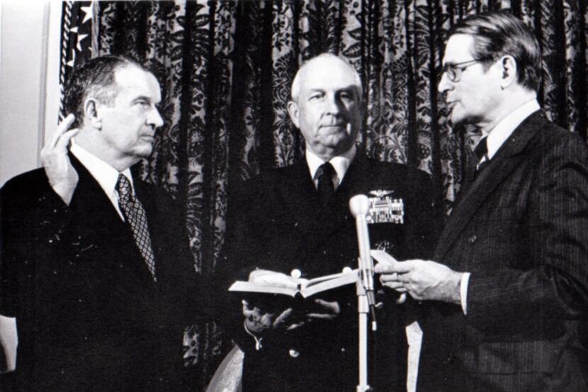Bill Clements (left) is sworn in as deputy secretary of defense by his boss, Secretary of...