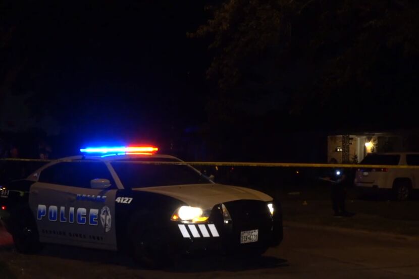Dallas police at the scene of a fatal shooting on Las Cruces Lane in Dallas on Saturday,...