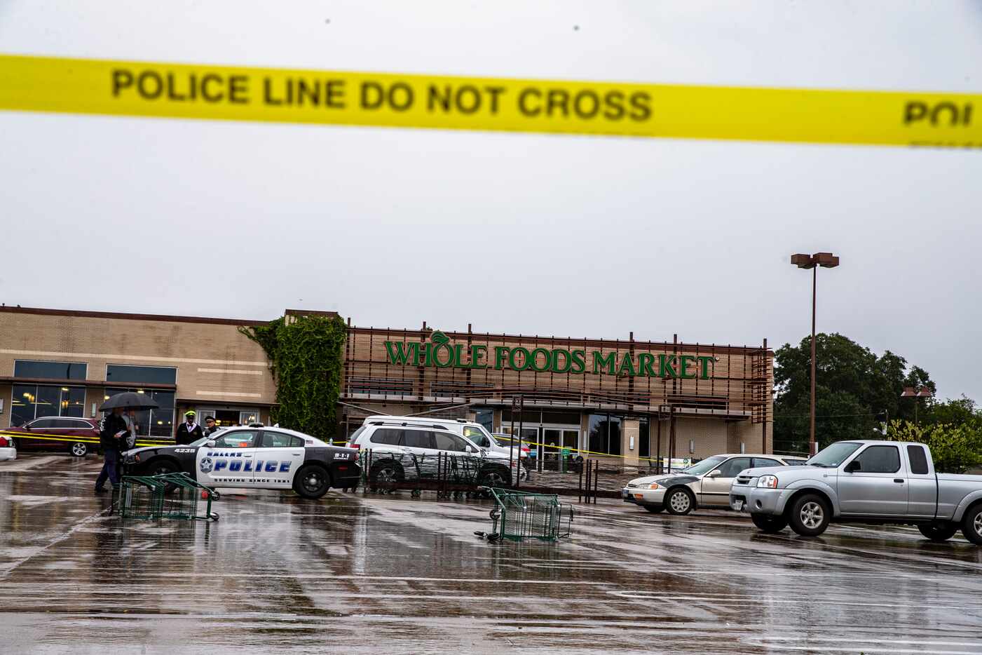 Police at the scene of an attempted robbery that was foiled by a Dallas Independent School...