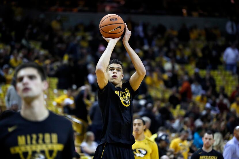 FILE - Missouri's Michael Porter Jr. warms up before the start of an NCAA college basketball...