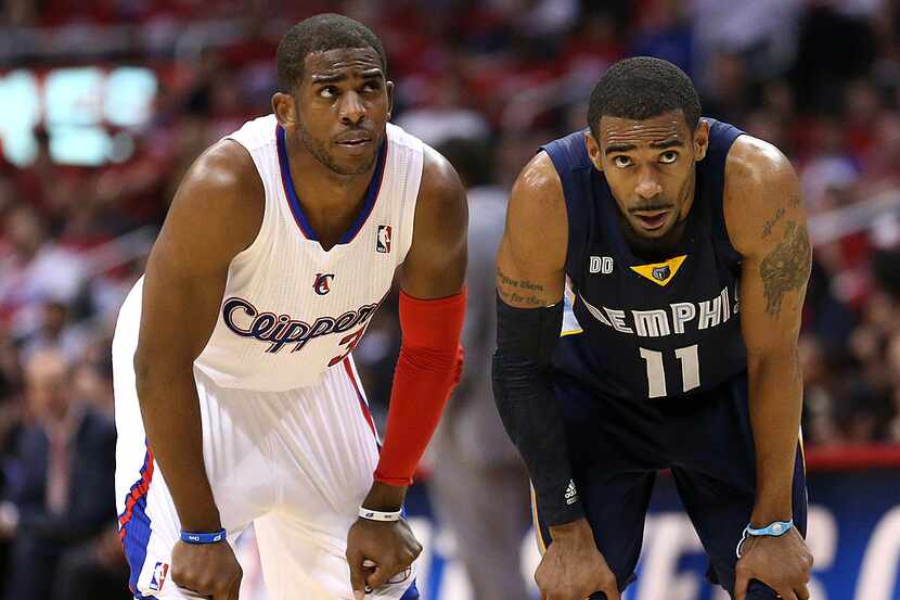 LOS ANGELES, CA - APRIL 30: Mike Conley #11 of the Memphis Grizzlies and Chris Paul #3 of...