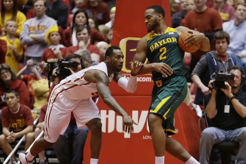 Baylor forward Rico Gathers, right, fights for a rebound with Iowa State guard DeAndre Kane...