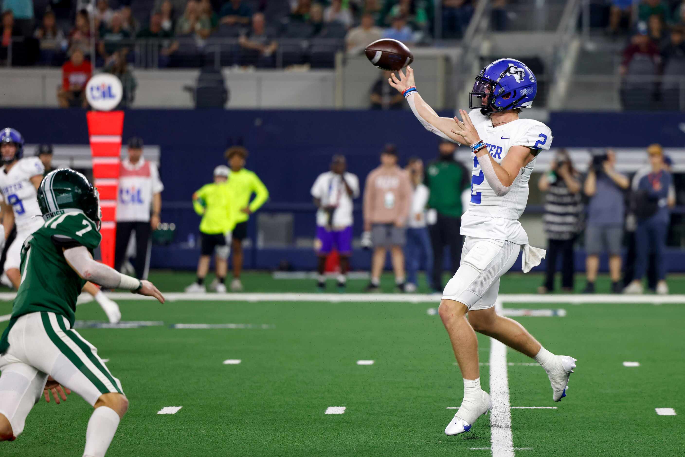 Gunter quarterback Hudson Graham (2) jumps to throw a pass over Franklin linebacker Seth...