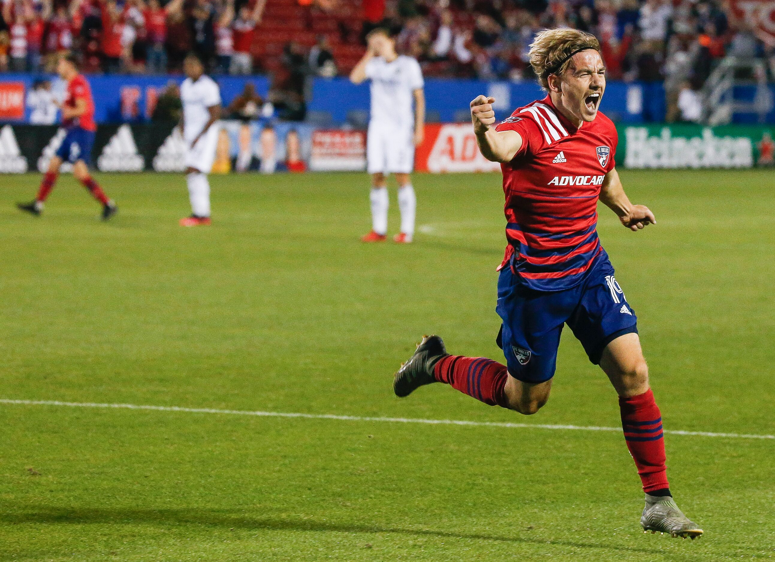 FC Dallas midfielder Paxton Pomykal (19) celebrates a goal during the second half of an MLS...