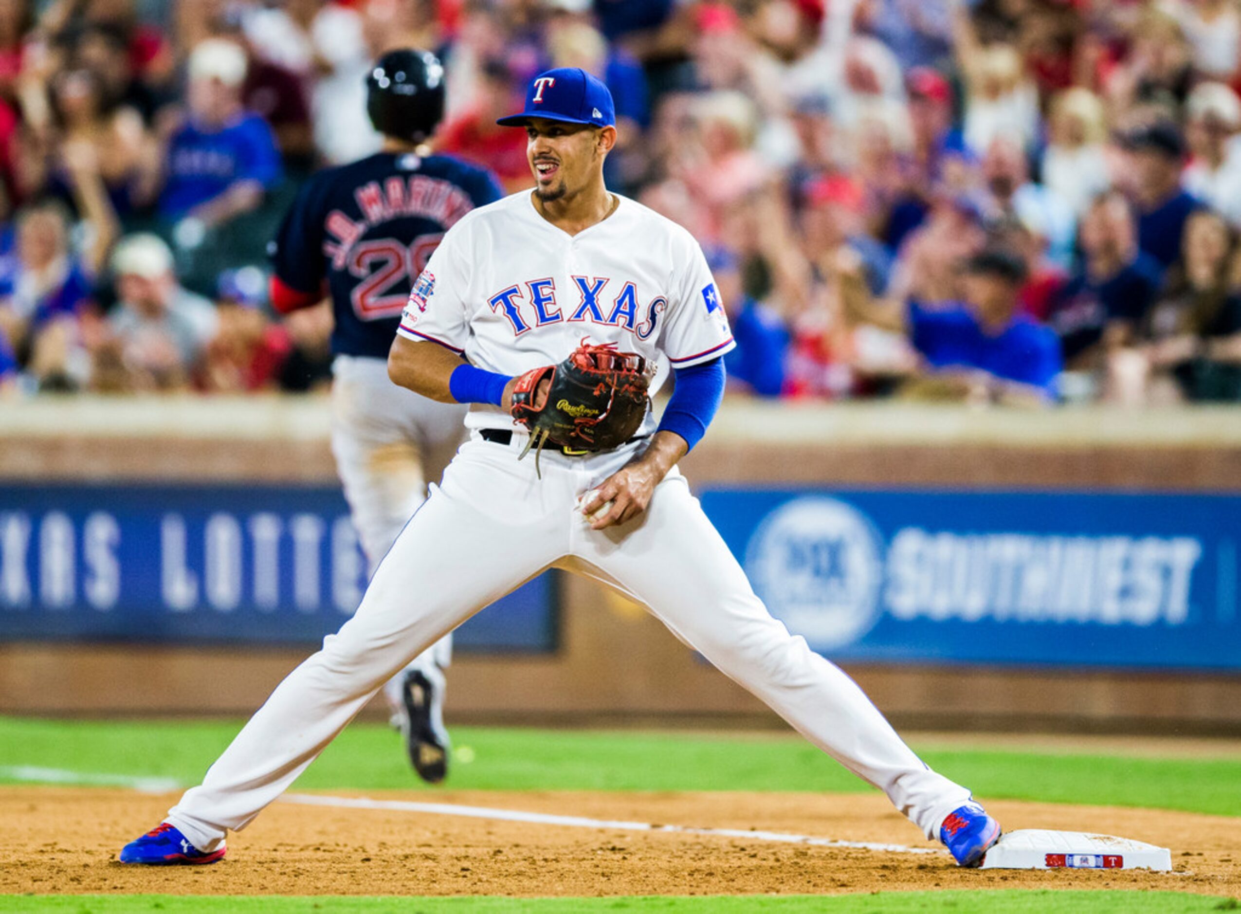 Texas Rangers first baseman Ronald Guzman (11) reacts after outing Boston Red Sox designated...