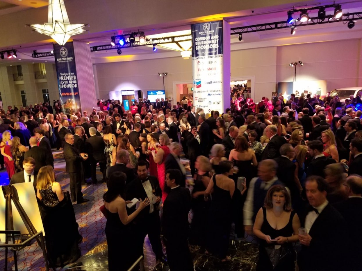 Texans and other revelers celebrated inauguration at the Black Tie & Boots ball Thursday,...