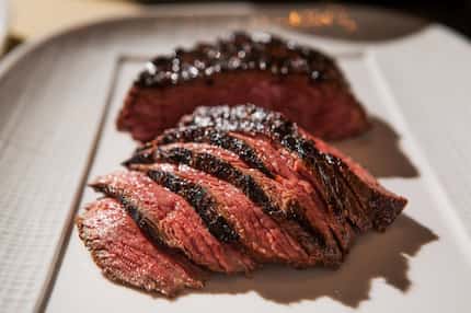 Chef John Tesar tours crews through his kitchen at Knife, a steakhouse in Dallas.