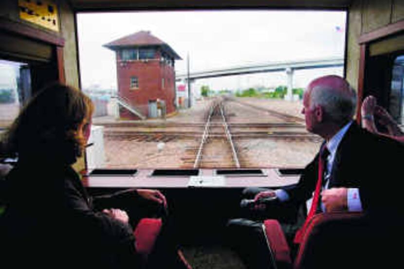  BNSF vice presidents Amy Hawkins and Rollin Bredenberg, in a special rail car, take state...