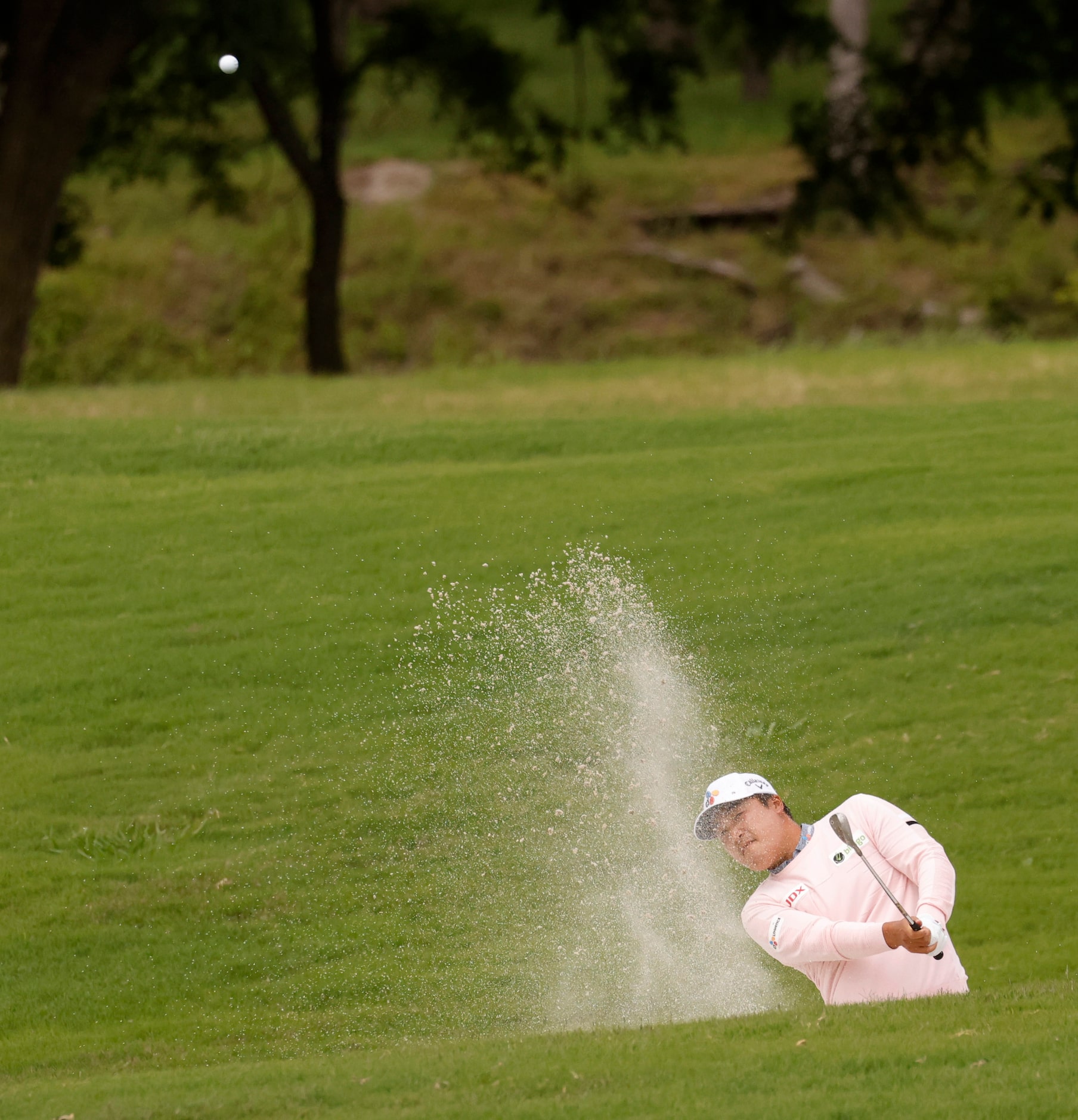 Kyoung-Hoon Lee hits from a bunker on the 6th hole during round 2 of the AT&T Byron Nelson ...