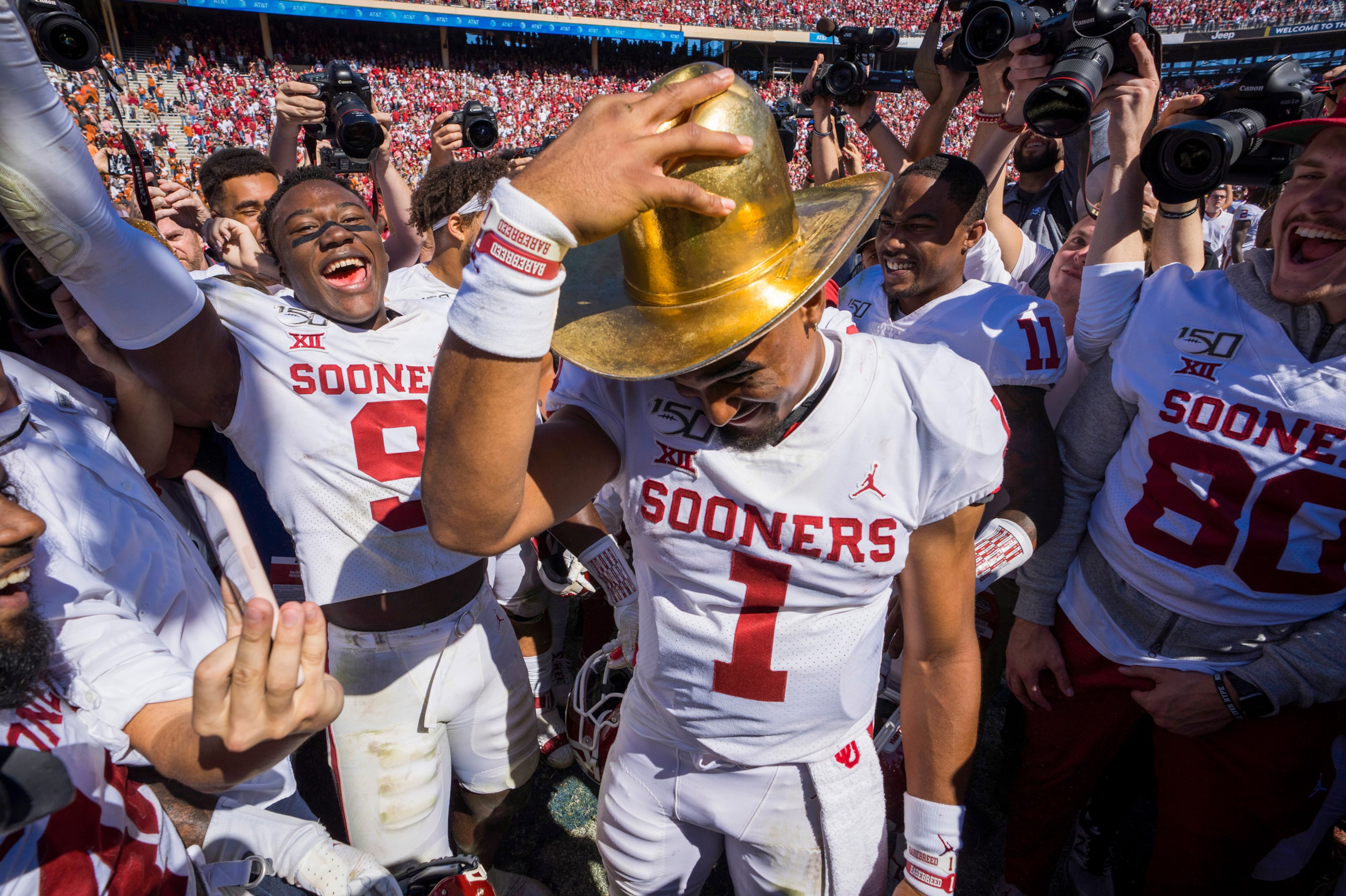 Oklahoma quarterback Jalen Hurts (1) dons the Golden Hat after the Sooners victory over...