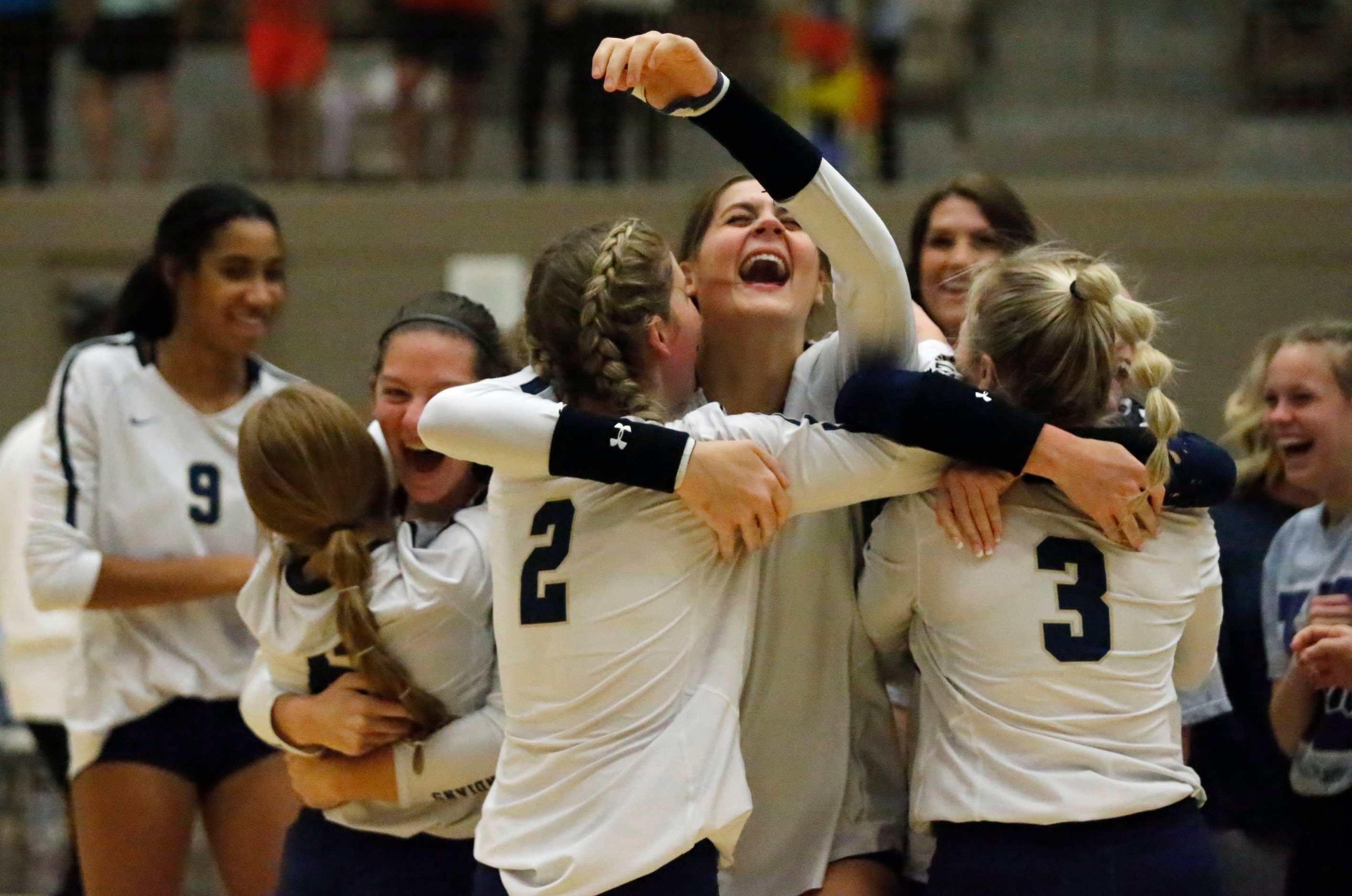 Keller High School setter Taylor Polivka (2) and Keller High School outside hitter Melanie...