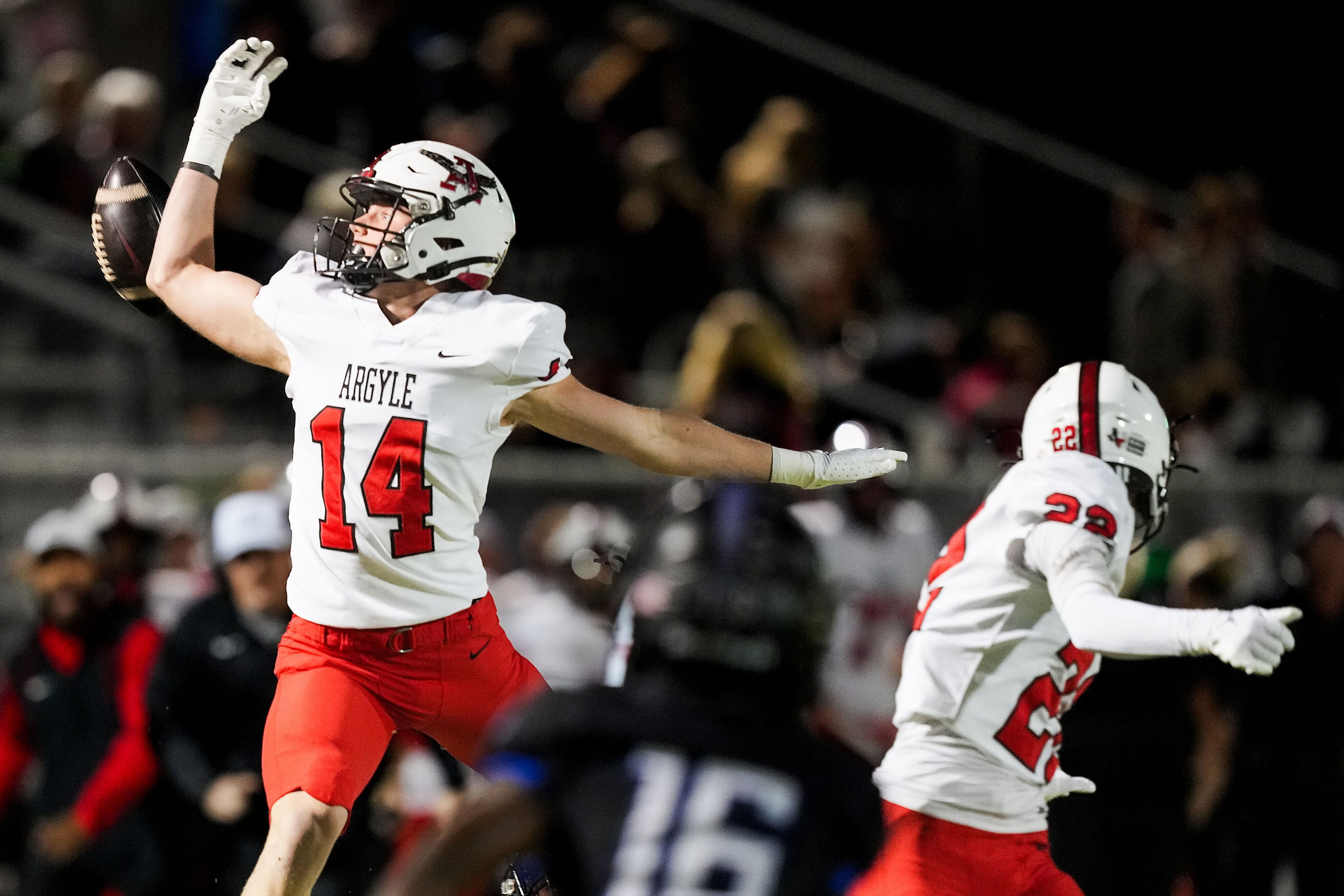 Argyle defensive back Sager Zamzow (14) reaches for an onside kick during the first half of...