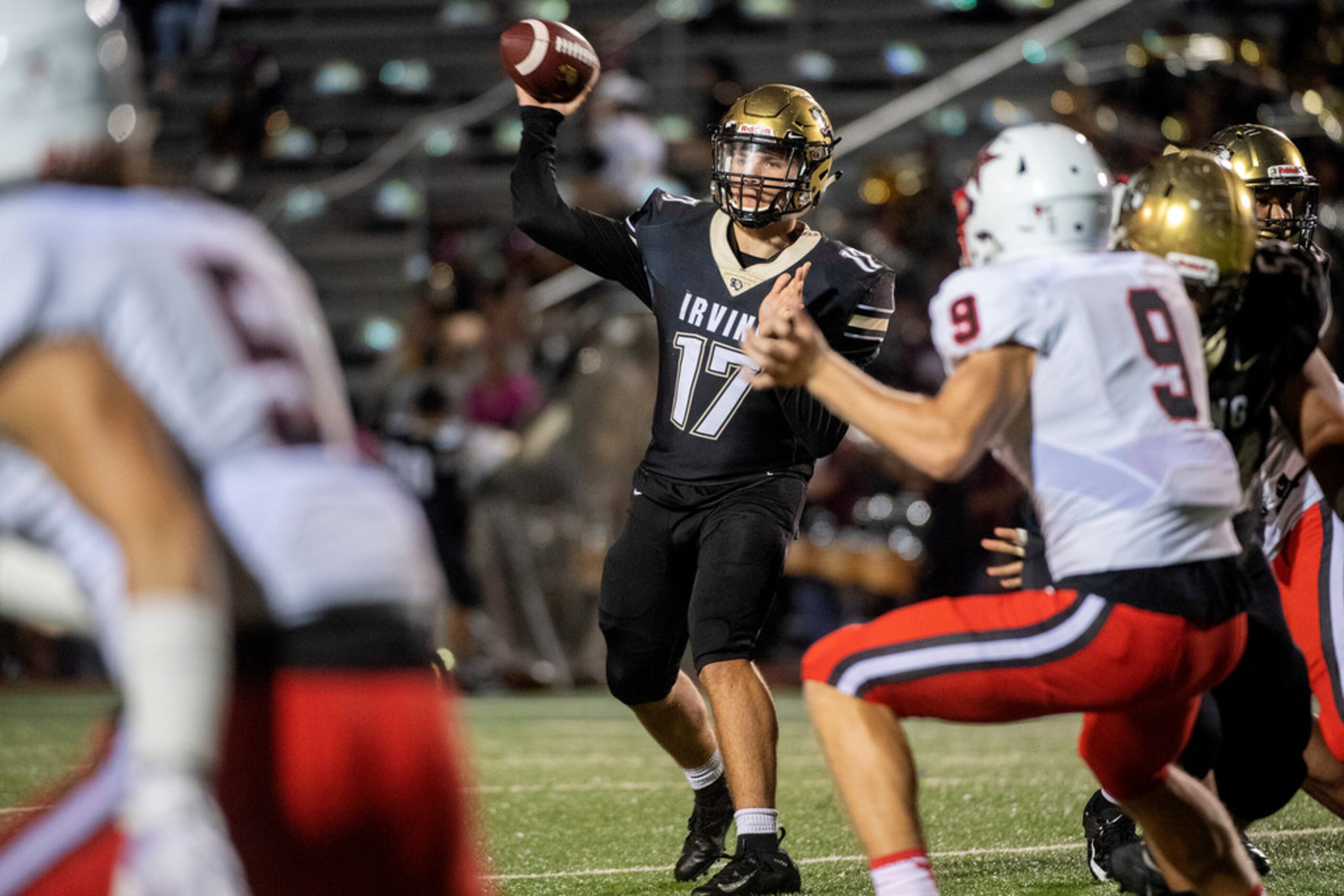 Irving senior quarterback Davion Millen (17) throws against Coppell during the second half...