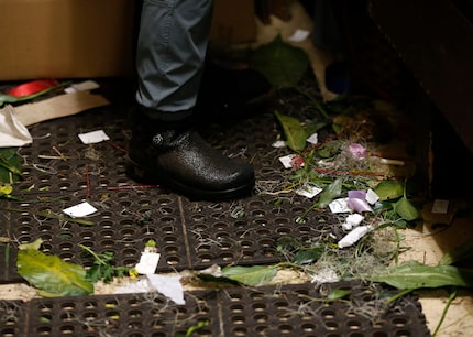 A designer works at McShan Florist in Dallas.