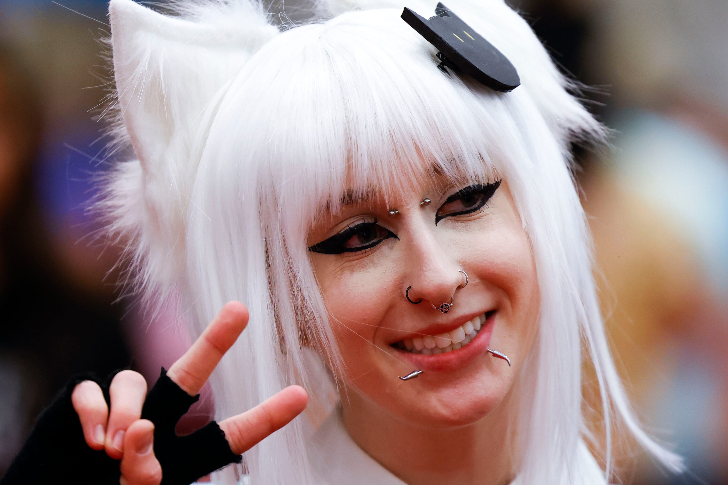 Ashlee Harrington, dressed as Koneko Tōjo from High School Dxd poses for a photo during Fan...