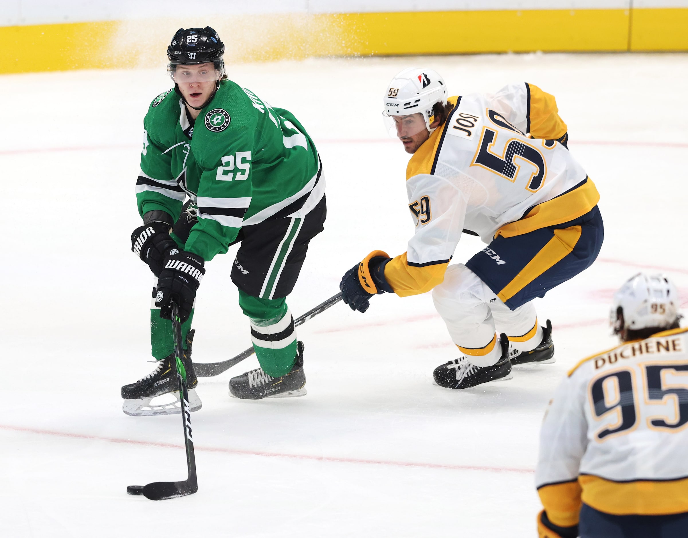 Dallas Stars left wing Joel Kiviranta (25) looks to pass as Nashville Predators defenseman...