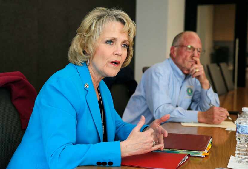 State Rep. Cindy Burkett, R-Sunnyvale, answers questions as state Sen. Bob Hall, R-Edgewood,...