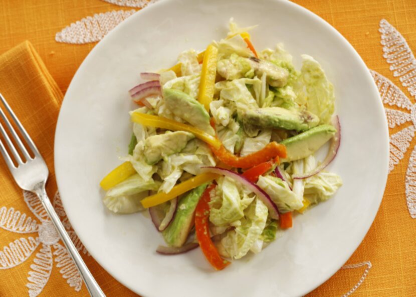 Napa Cabbage Salad with Avocado and Bell Pepper can be plated ahead of time, or served from...