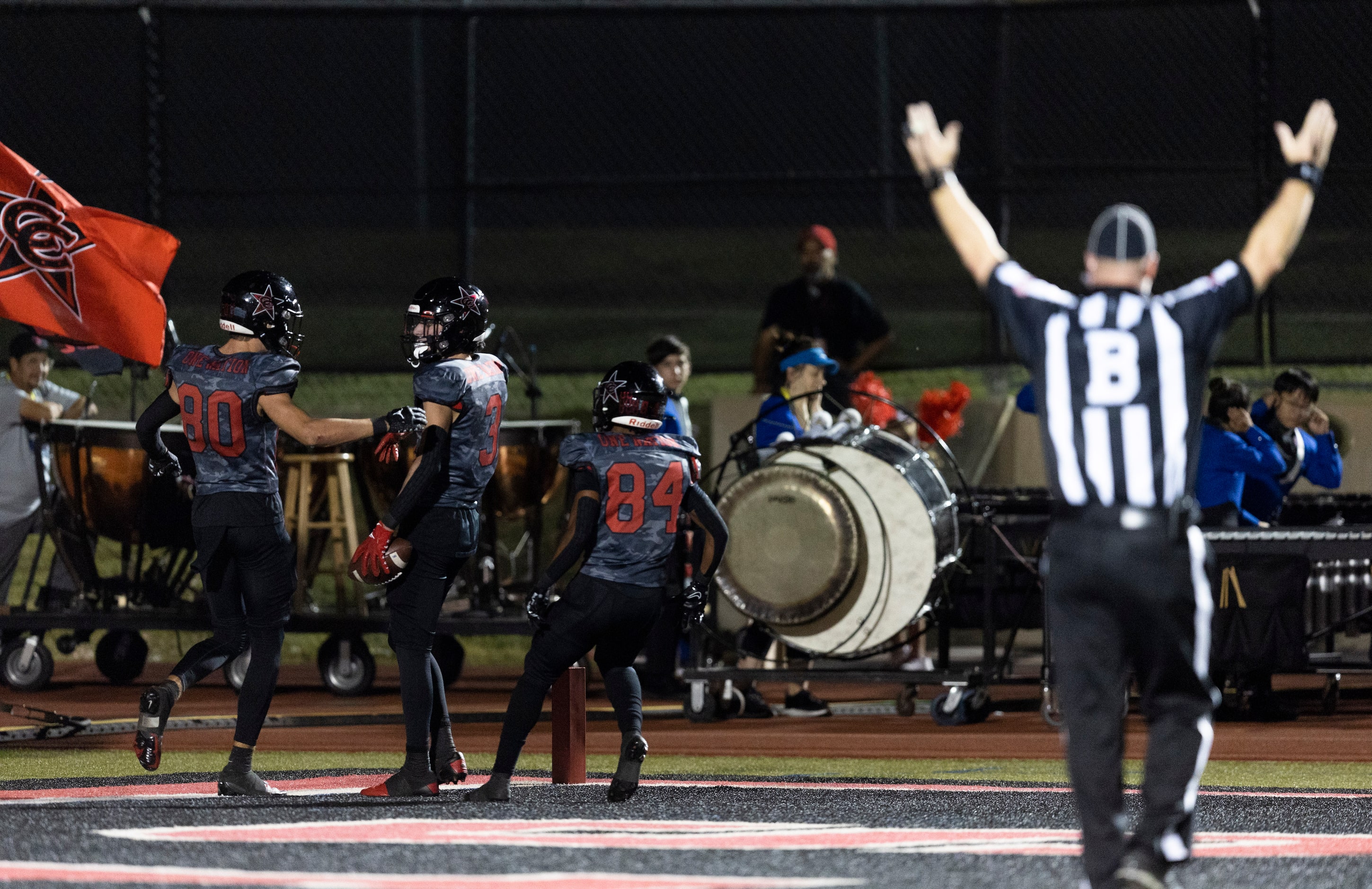 Coppell senior wide receiver Carter Kincaid (3) is congratulated by junior wide receivers...