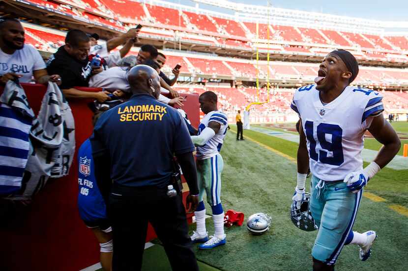 Dallas Cowboys wide receiver Brice Butler (19) celebrates as he leaves the field following a...
