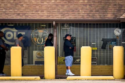 Customers have lined up to get into Ray's Hardware and Sporting Goods, a gun shop on...