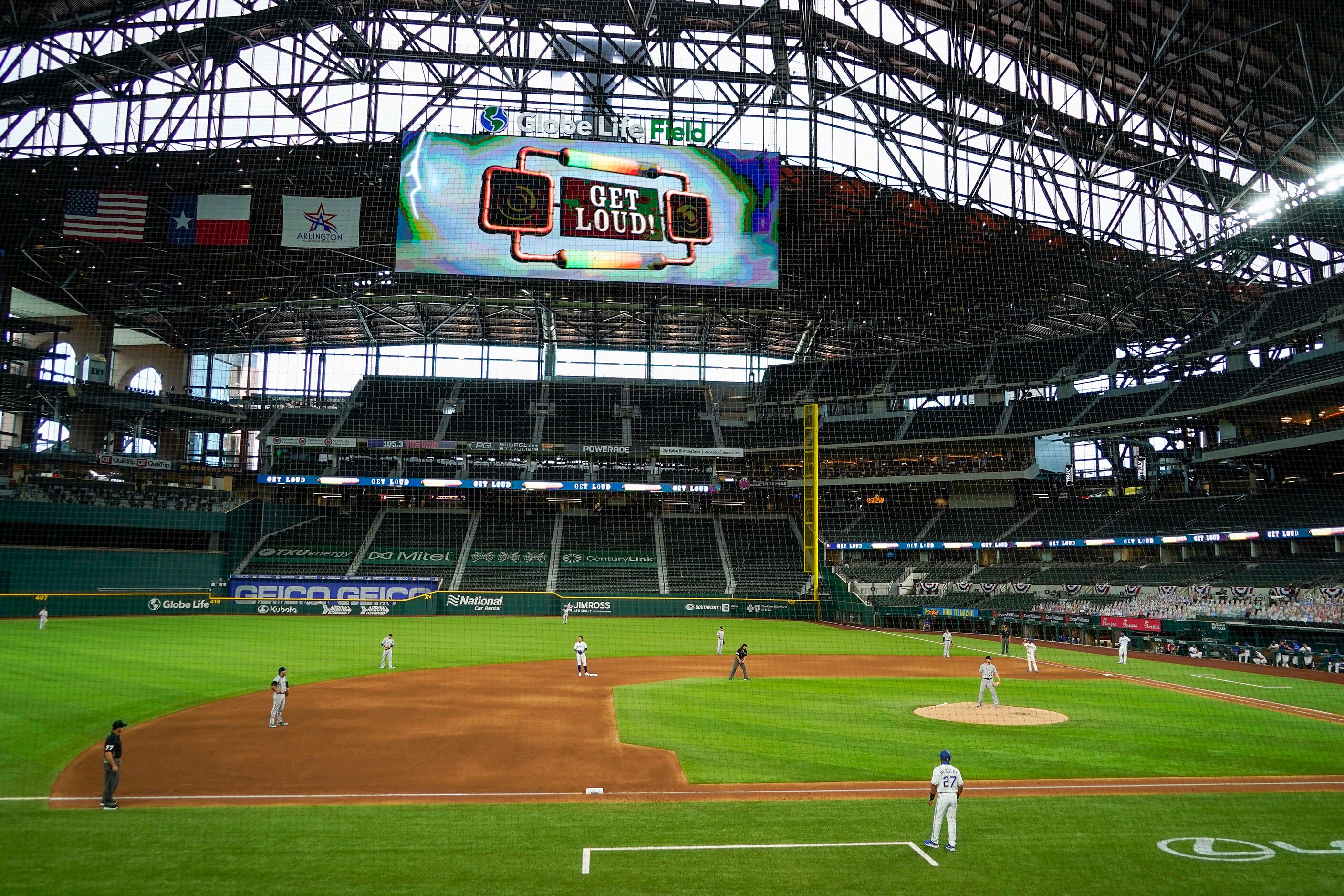 A message on the video board encourages the empty stadium to ÒGet Loud!Ó as the Texas...