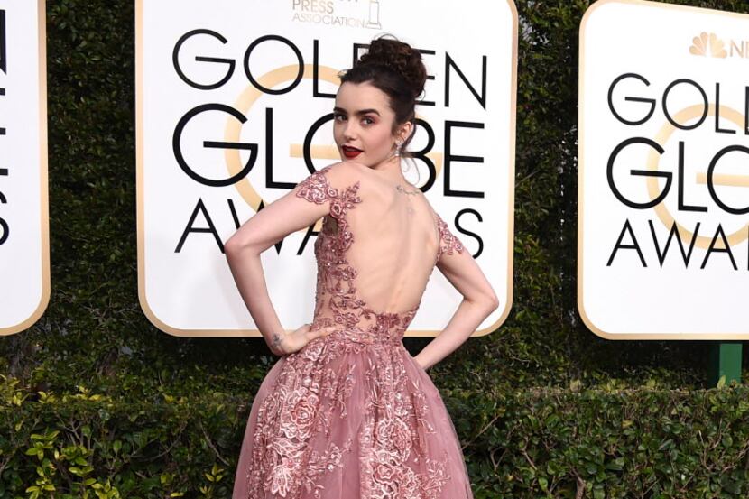 Lily Collins at the 74th annual Golden Globe Awards