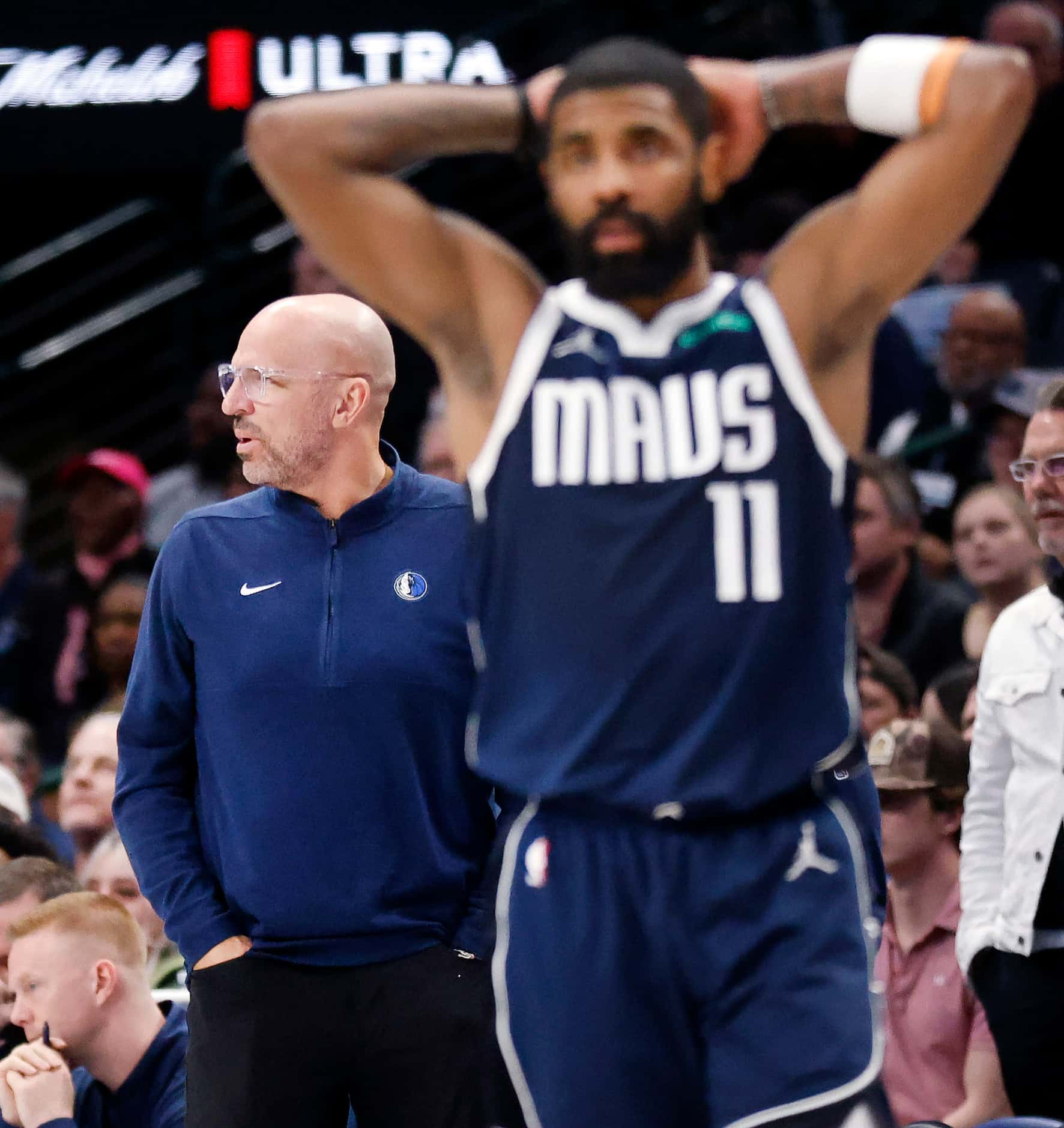 Dallas Mavericks head coach Jason Kidd reacts after guard Kyrie Irving (11) was called for a...