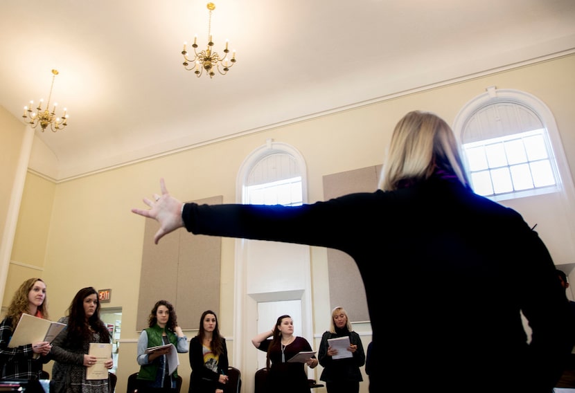 Avant Chamber Ballet artistic director Katie Cooper works with the singers of the Verdigris...