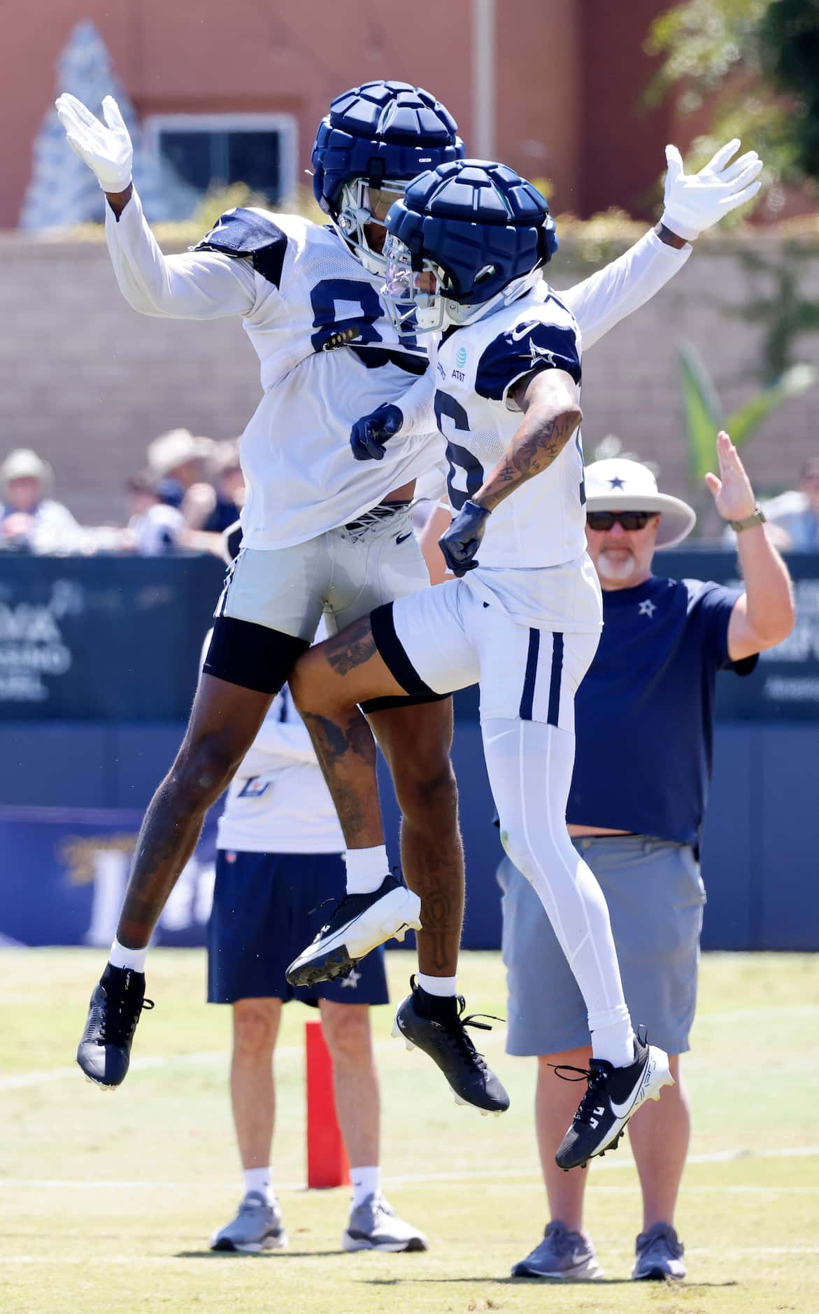 Dallas Cowboys wide receiver Racey McMath (80) congratulates fellow wide receiver Jalen...