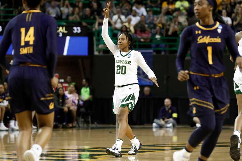 Baylor guard Juicy Landrum (20) celebrates after sinking a three-point basket as California...